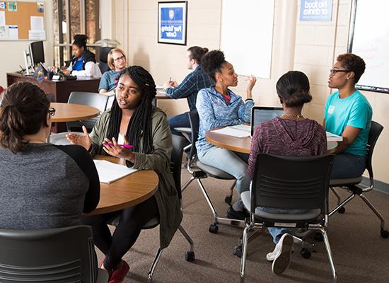 students working together in the center for academic success